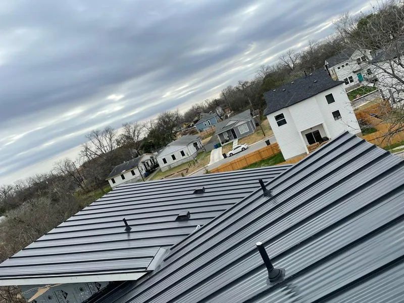 Standing seam metal roof panels with vents for Skylight Repair in Forest City